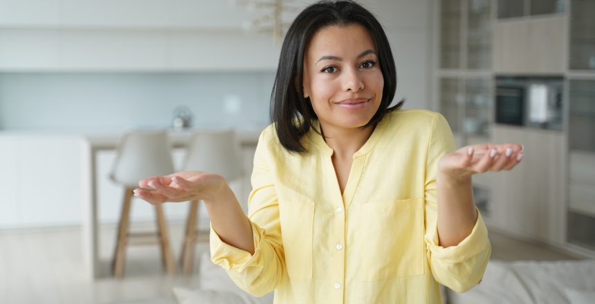 puzzled-woman-feels-perplexity-shrugging-shoulders